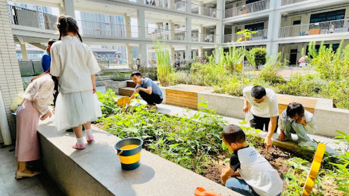 Young students gardening in an urban landscape