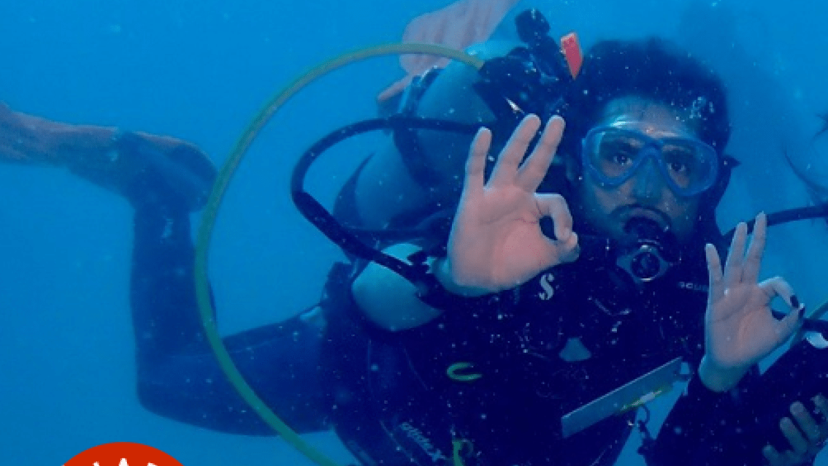 Photo of Carlos scuba diving