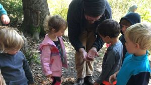 Zachary teaches students in the woods