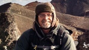 Photo of Dr. David Allen on top of Mount Fuji