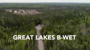 A forest with the words "Great Lakes B-WET"