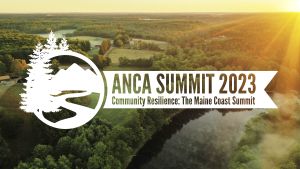 A white logo with a backdrop of an aerial landscape photo. The logo says "ANCA Summit 2023 — Community Resilience: The Maine Coast Summit." The backdrop photo is an aerial picture of a sunrise over mostly forested land, with a river in the bottom right corner.