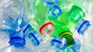Closer up photograph of used plastic bottles ready for recycling