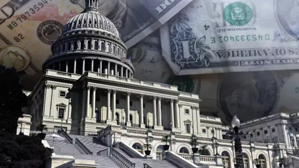 Photo of the U.S. Capitol with images of dollars in the background