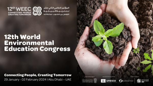 Brown background with white text on the left and a photo of a pair of hands holding some soil and a seedling. The white text says, "12th World Environmental Education Congress."
