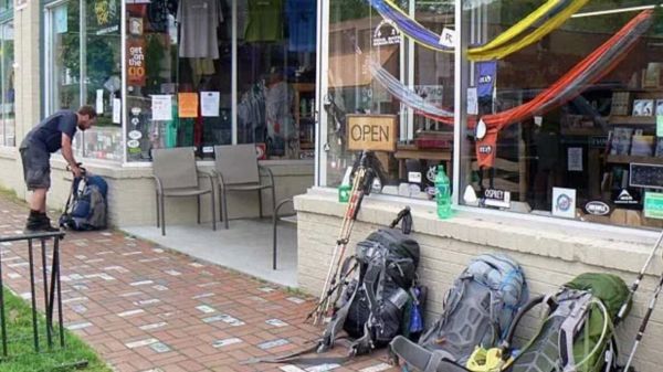 Backpacker outside retail store