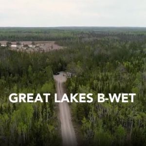 A forest with the words "Great Lakes B-WET"