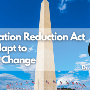 Photo of the Washington Monument in the background with a semi-transparent white overlay in front with white text on the left and a profile photo of a man in glasses on the right. The text reads, "The Inflation Reduction Act Does Adapt to Climate Change"