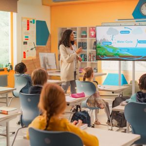 Primary school classroom where the teacher educating kids on water cycle