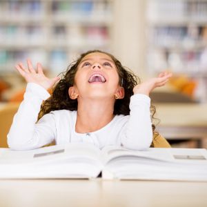 happy young student with book open