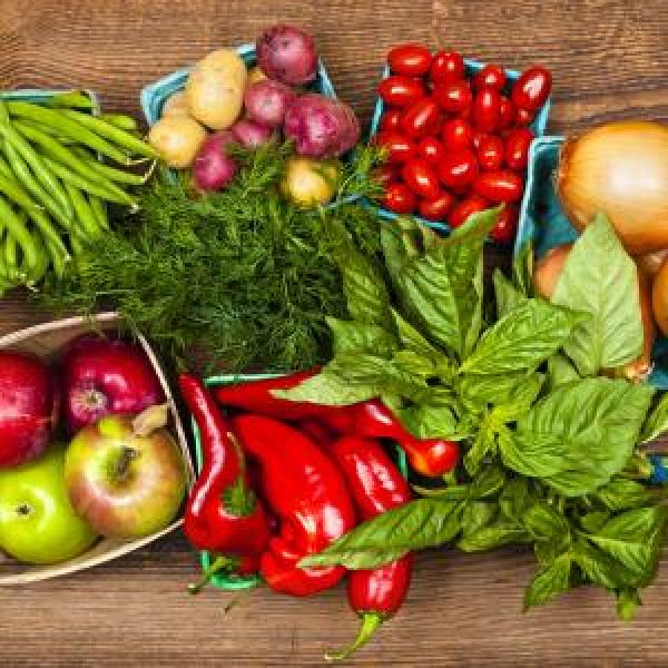 Quart farmer's market boxes with brightly colored apples, green beans, tomatoes, red peppers, basil, and onion.