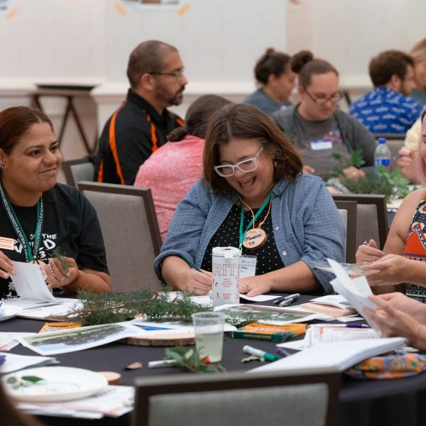 Four educators doing an environmental education activity at a PLT Training. Photo credit: PLT 