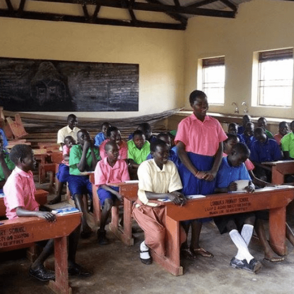 Classroom with a student standing to speak near the front